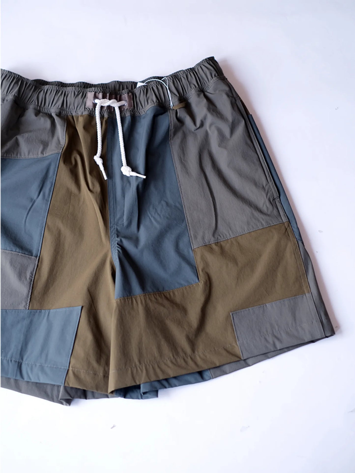 UNFRM "2WAY STRETCH PATCHWORK BAGGY SHORTS(2colors)"