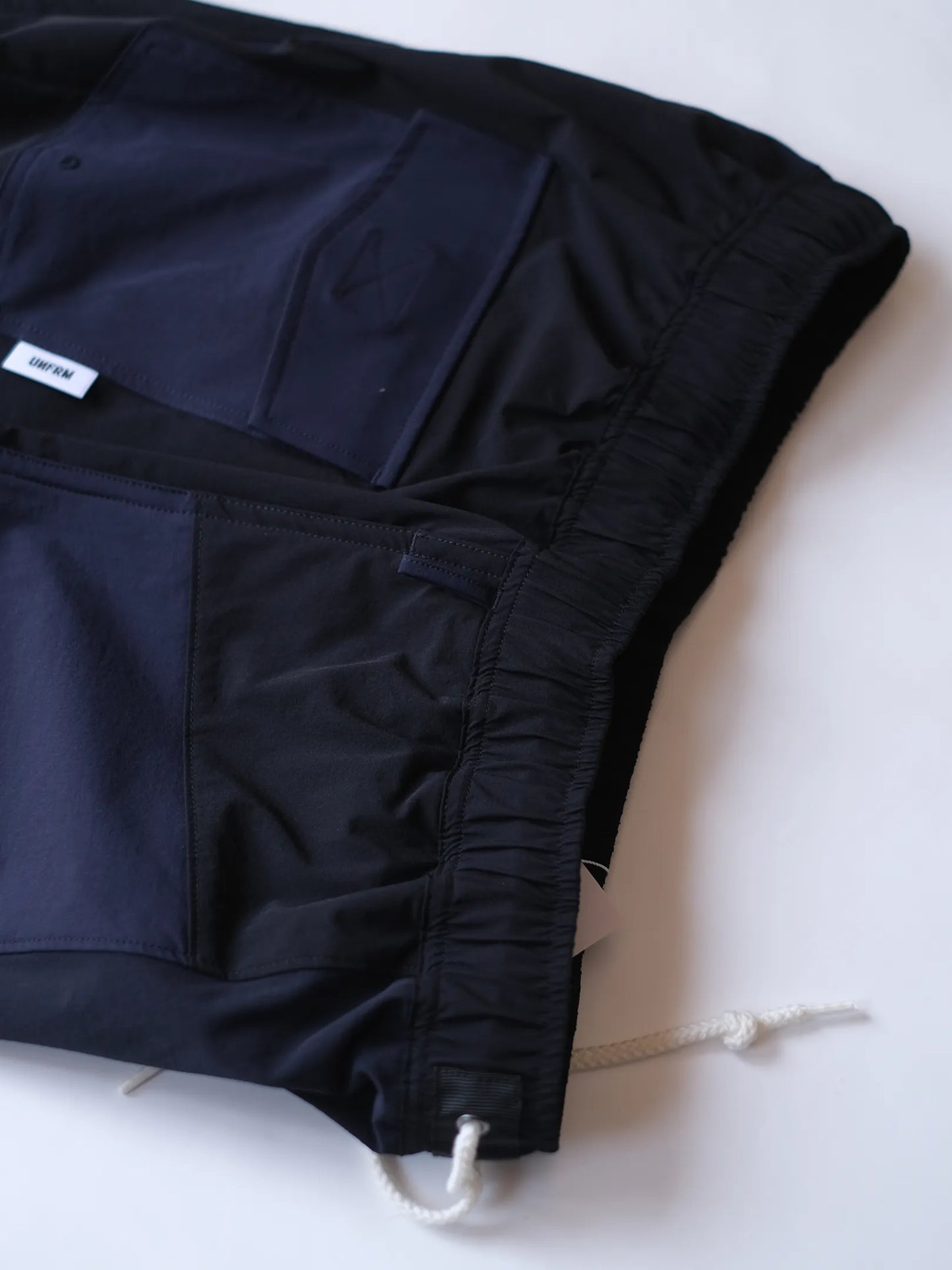 UNFRM "2WAY STRETCH PATCHWORK BAGGY SHORTS(2colors)"