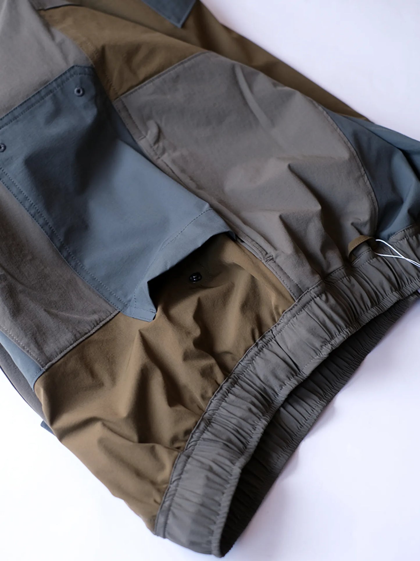 UNFRM "2WAY STRETCH PATCHWORK BAGGY SHORTS(2colors)"