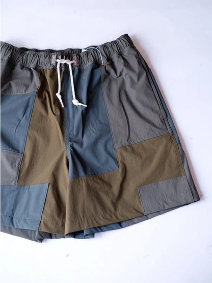 UNFRM "2WAY STRETCH PATCHWORK BAGGY SHORTS(2colors)"