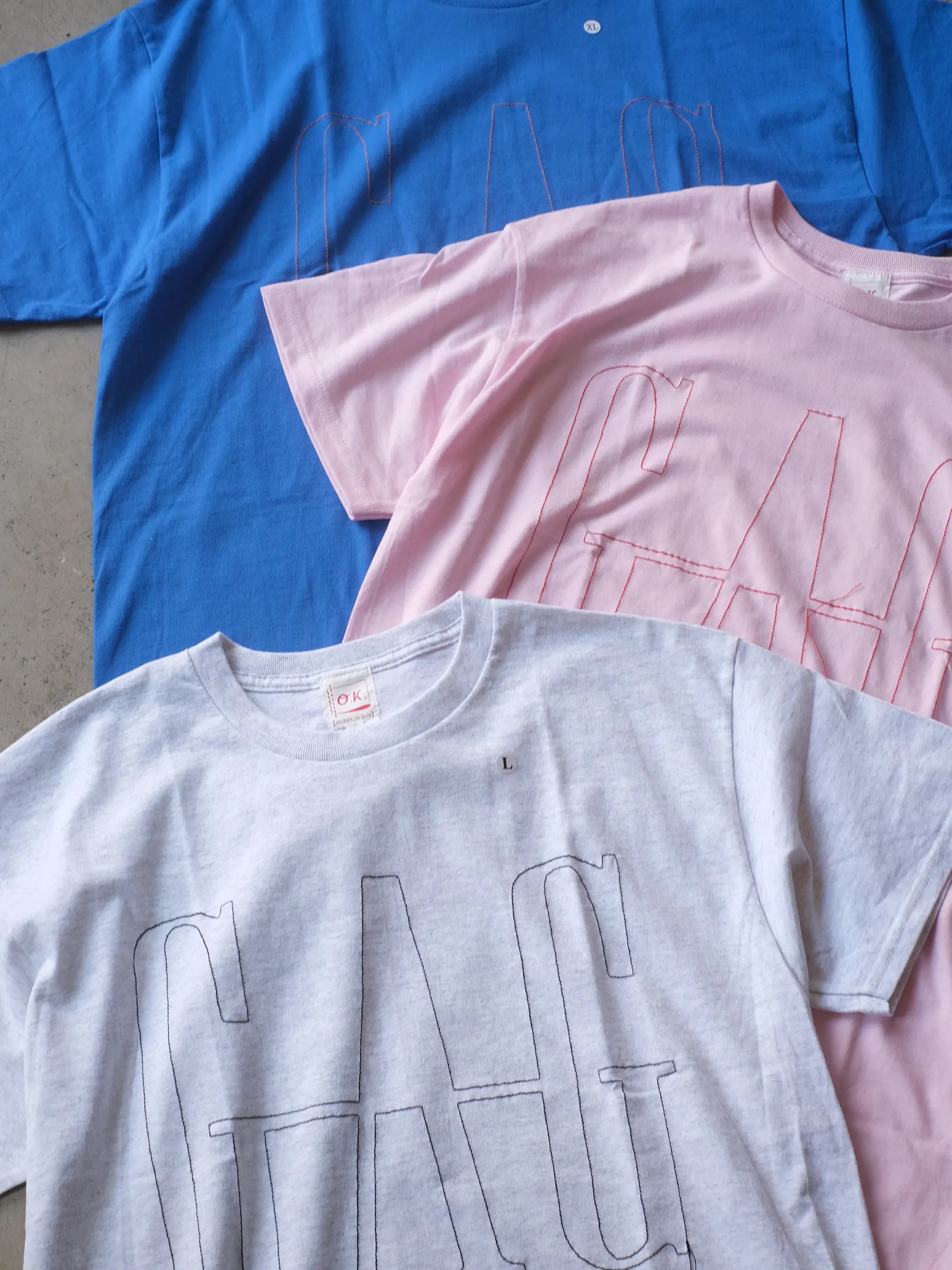 O.K. "『GAG』一筆描きステッチ　S/S TEE(3colors)"