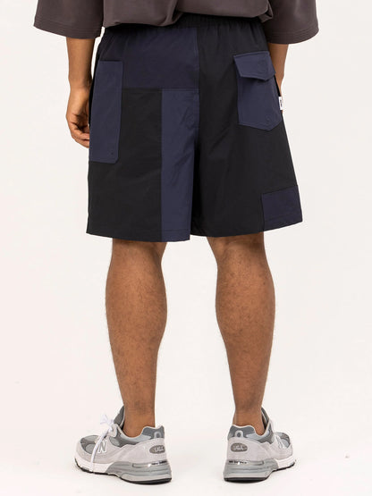 UNFRM "2WAY STRETCH PATCHWORK BAGGY SHORTS(2colors)"