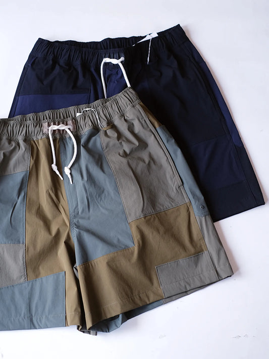 UNFRM "2WAY STRETCH PATCHWORK BAGGY SHORTS(2colors)"