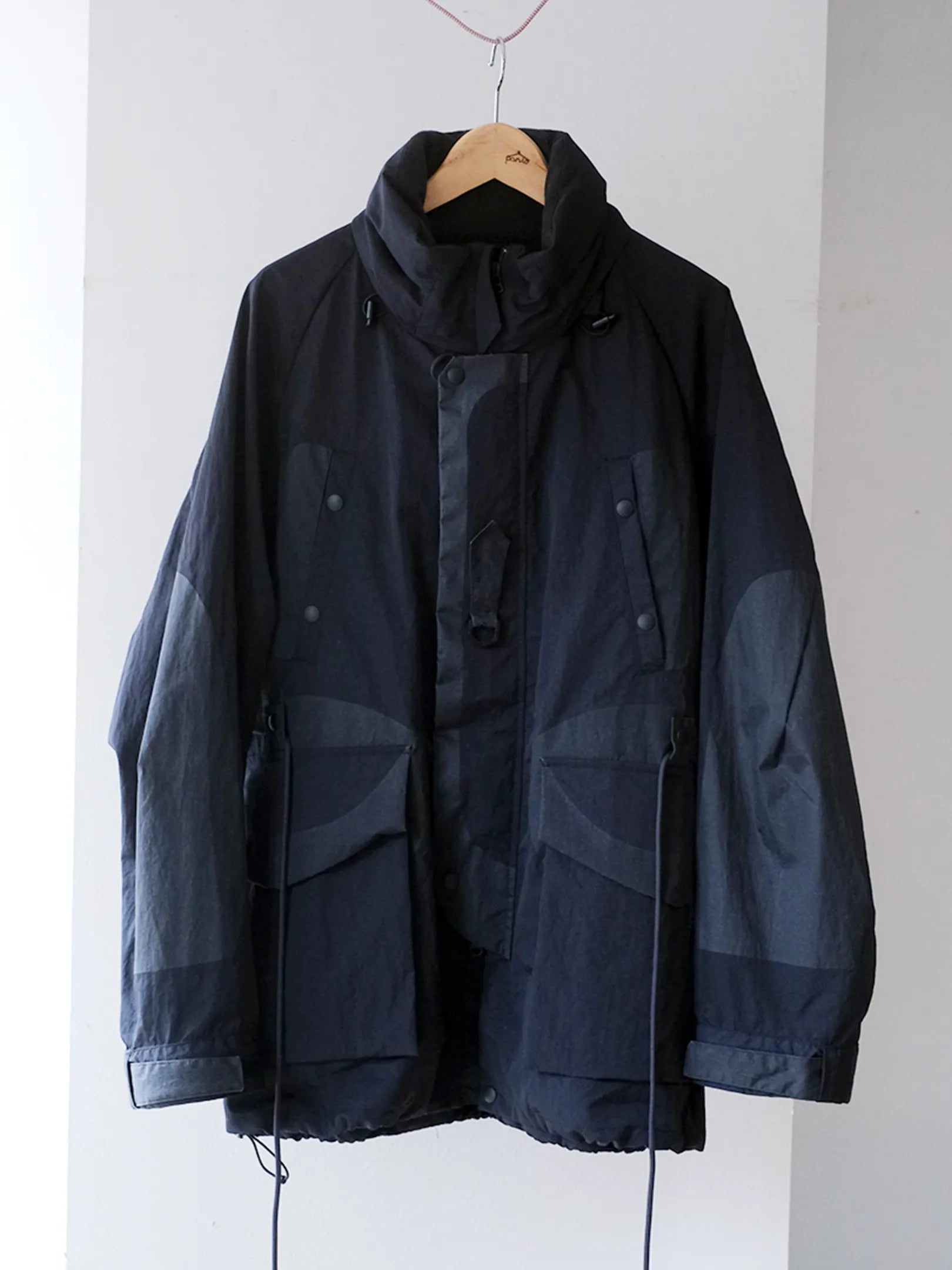 norbit by Hiroshi Nozawa "Printed patch mountain parka(NAVY)"