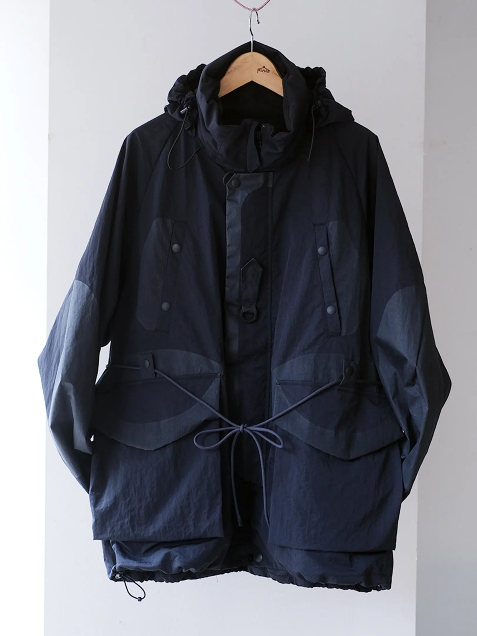 norbit by Hiroshi Nozawa "Printed patch mountain parka(NAVY)"