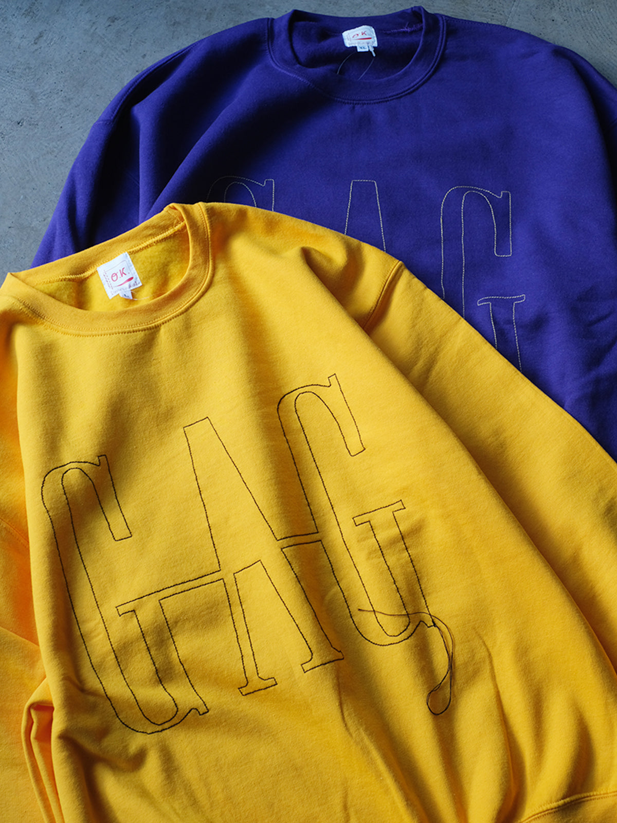 O.K. "『GAG』一筆描きステッチ　CREW SWEAT(2colors)"