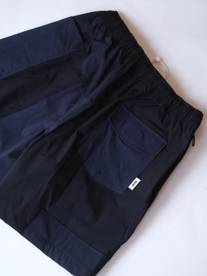 UNFRM "2WAY STRETCH PATCHWORK BAGGY SHORTS(2colors)"