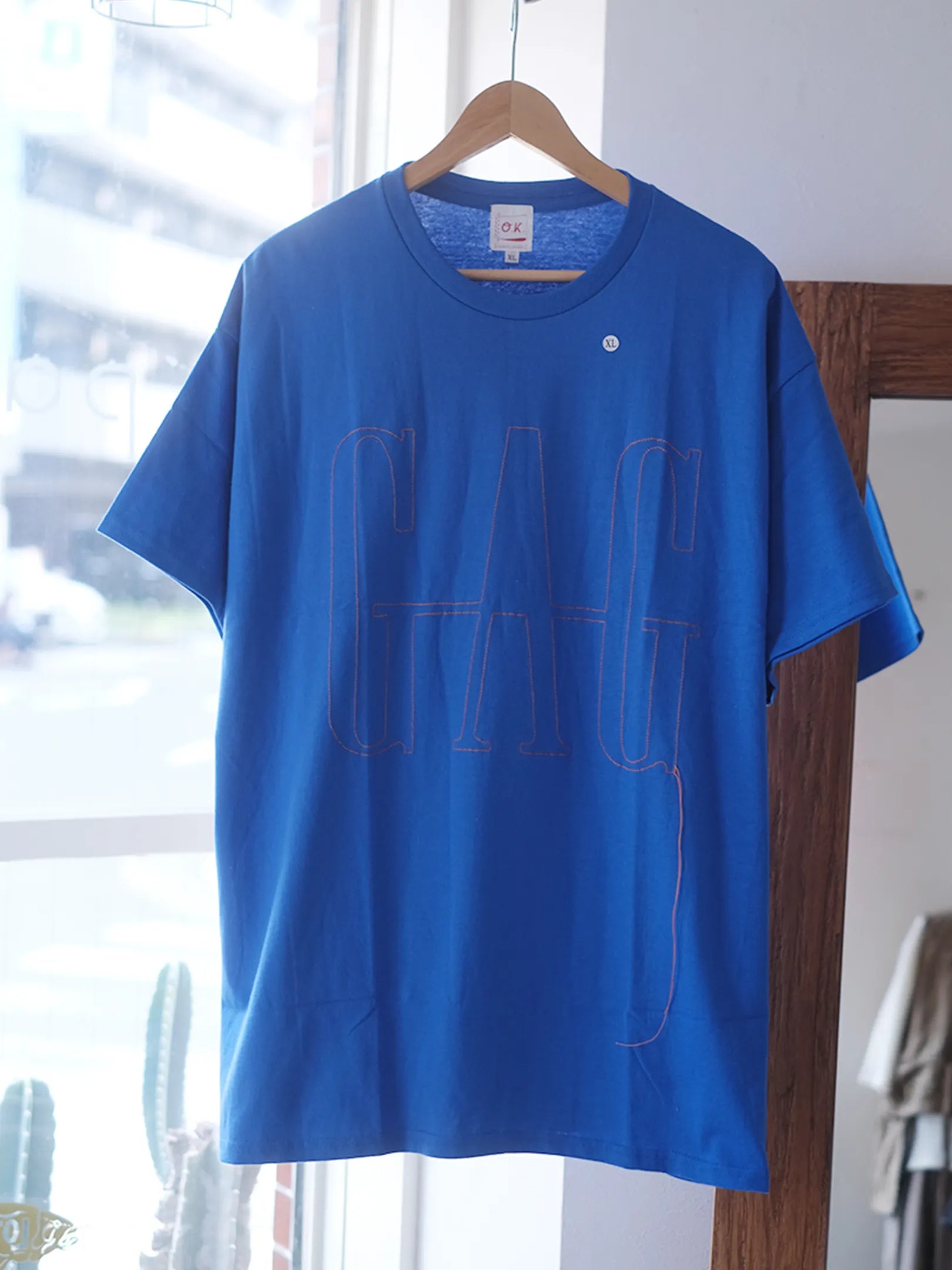 O.K. "『GAG』一筆描きステッチ　S/S TEE(3colors)"
